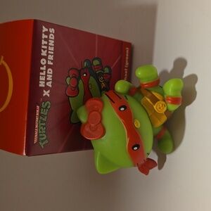 Sanrio Hello Kitty x Raphael Green and Red Figure